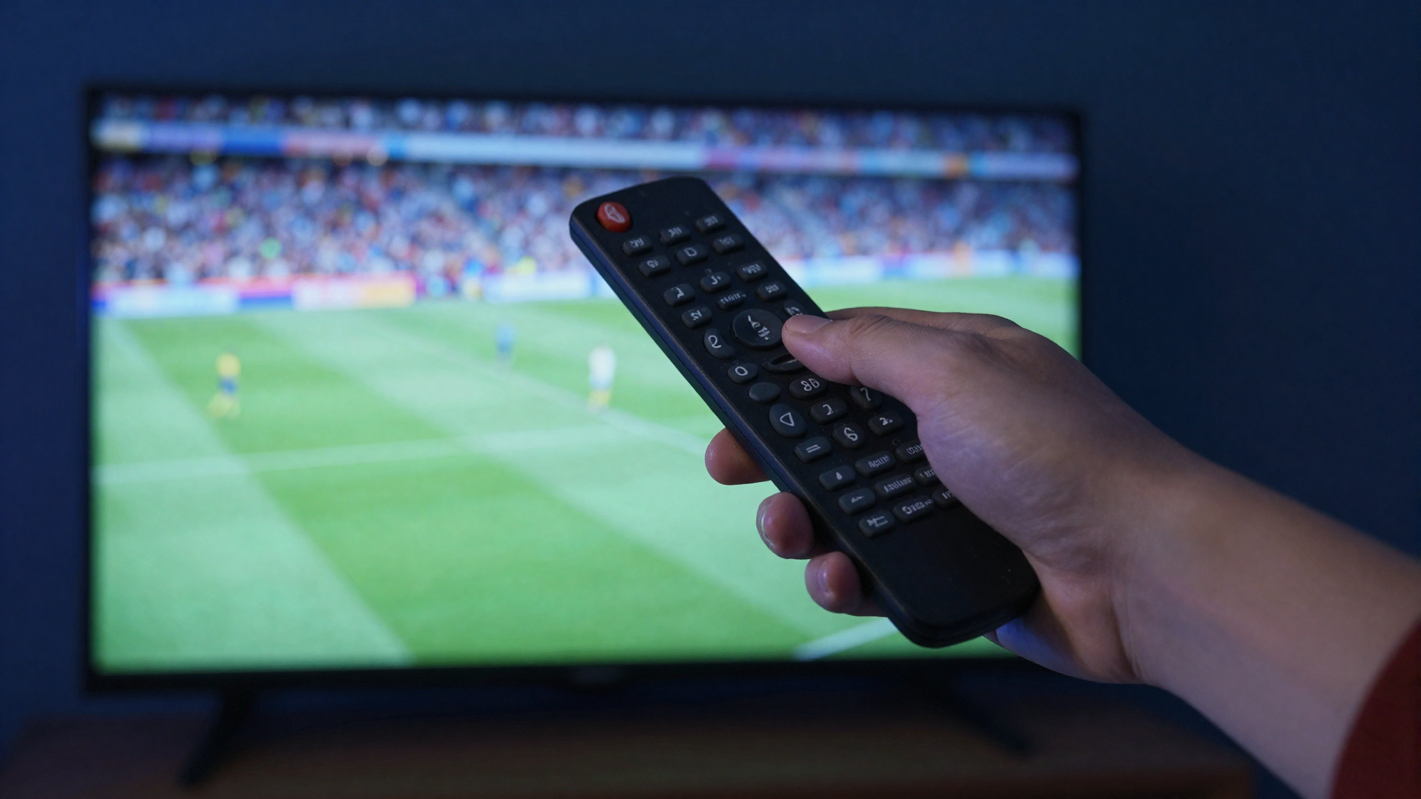 Abonnement IPTV - Télécommande et match de foot en direct